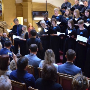 Zdjęcie przedstawia koncert chóru  Piast z Żyglina na XI Świerklanieckich Spotkaniach Chóralnych w Pałacu Kawalera